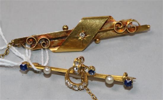 A Victorian 15ct gold and diamond set bar brooch and one other yellow metal, diamond and gem set bar brooch, largest 52mm.